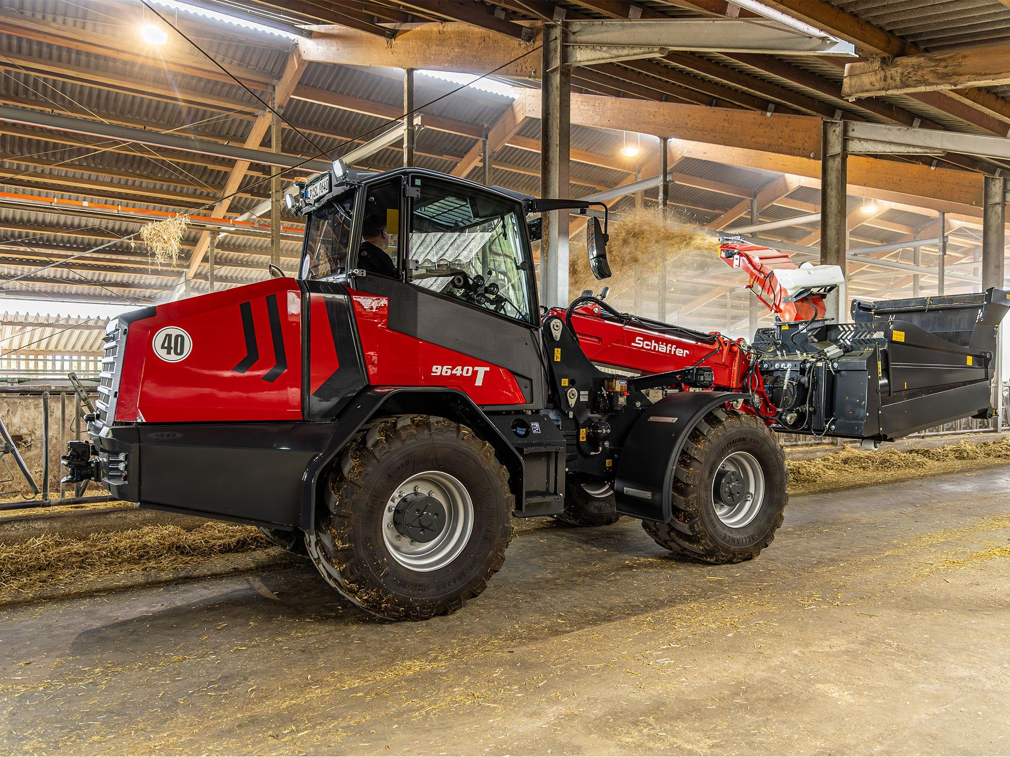 Schaeffer compact wheeled loader in agricultural use